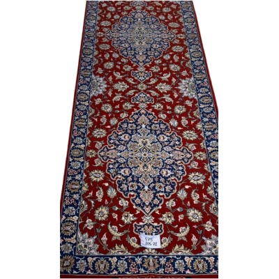 "Handcrafted red Persian rug runner with silk warp and floral medallion design, made in Isfahan by Karbasi Zadeh"