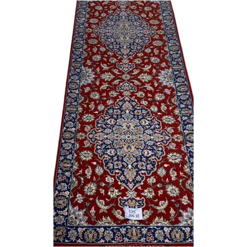 "Handcrafted red Persian rug runner with silk warp and floral medallion design, made in Isfahan by Karbasi Zadeh"