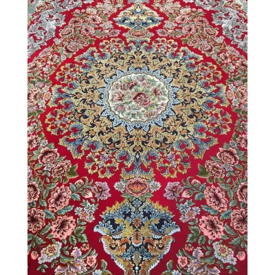 Persian rug for sale featuring floral patterns and luxurious wool and silk materials