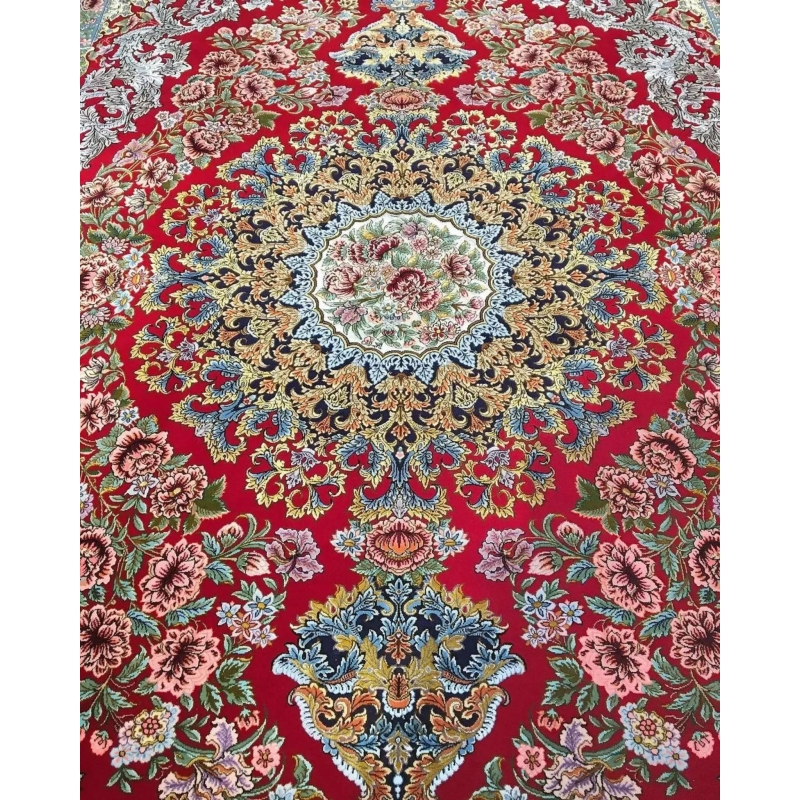 Persian rug for sale featuring floral patterns and luxurious wool and silk materials