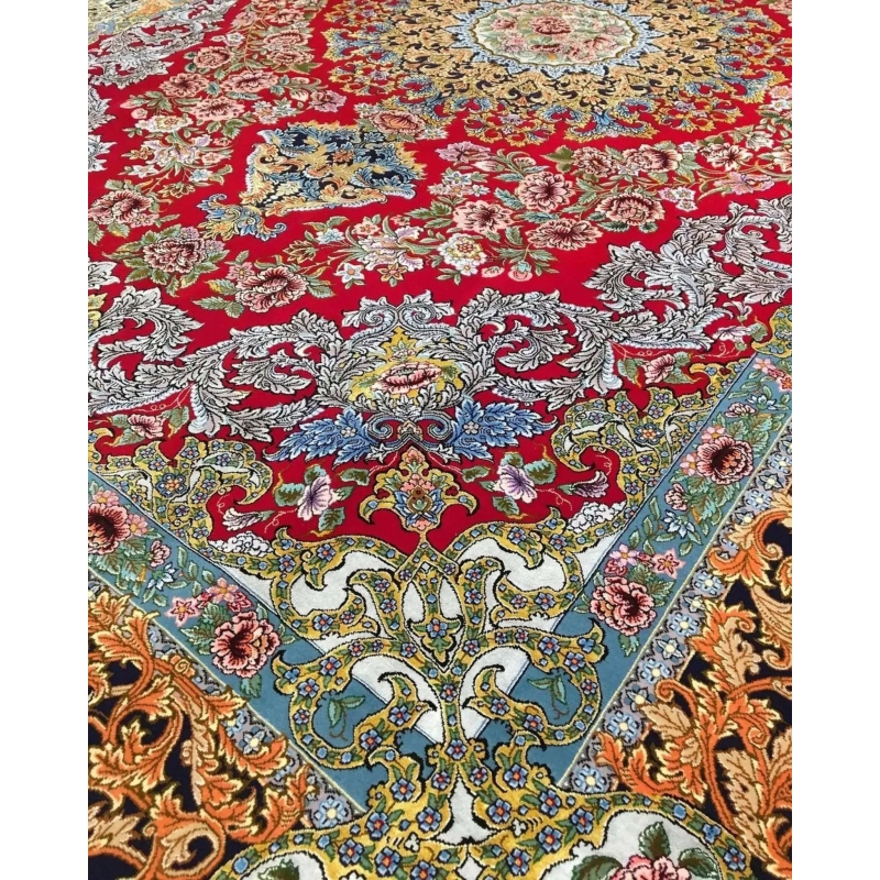 Fine Persian rug in red and gold tones with intricate detailing and hand-knotted texture