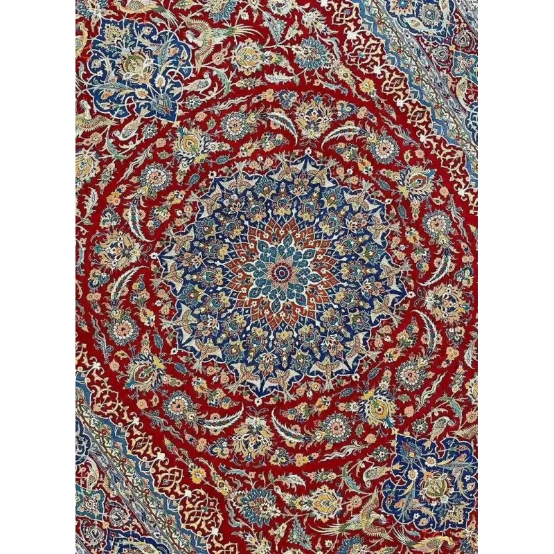 Detailed view of the Isfahan Persian carpet's central medallion in red and blue