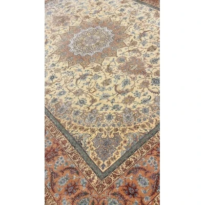 "Luxurious hand-knotted Persian rug with blue and rust accents, 810,000 knots"