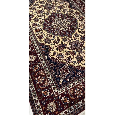 "Authentic Persian rug in 223x150 cm, made with natural dye, wool, and silk warp. Decorative oriental rug, perfect for luxury home decor. Handcrafted in Isfahan, Iran, and available in limited stock."