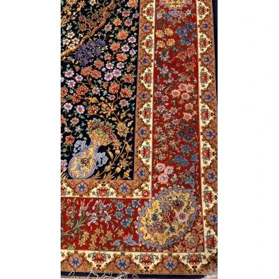 Floral and fauna patterns woven into the fabric of an Isfahan Bartarian Persian rug