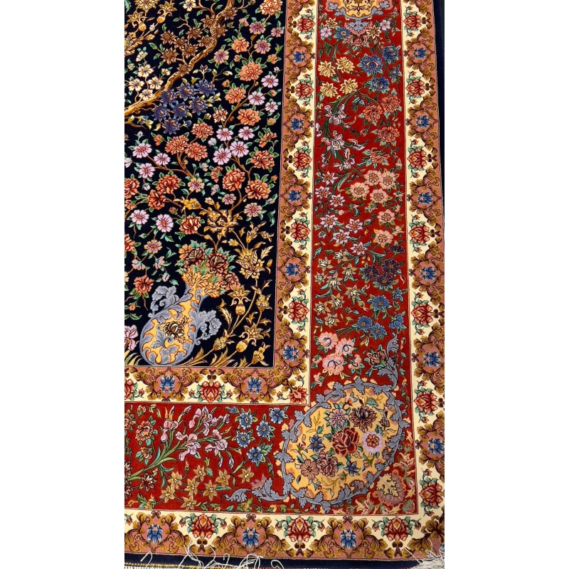 Floral and fauna patterns woven into the fabric of an Isfahan Bartarian Persian rug