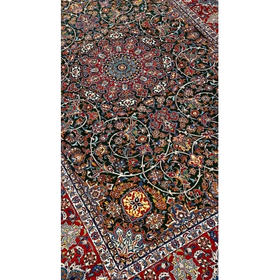 "Detailed corner view of the Seirafian carpet with traditional floral motifs."