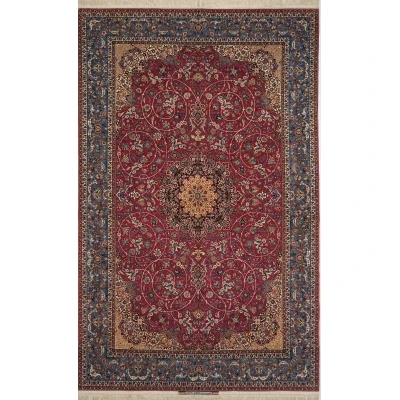 Antique Persian Rug by Ahmad Seirafian – A 75-year-old hand-knotted Isfahan rug featuring an intricate floral medallion on a rich red field, framed by an ornate blue and gold border, crafted from silk and wool.