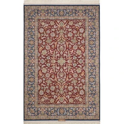 Hand-knotted red and blue Persian rug with intricate floral design