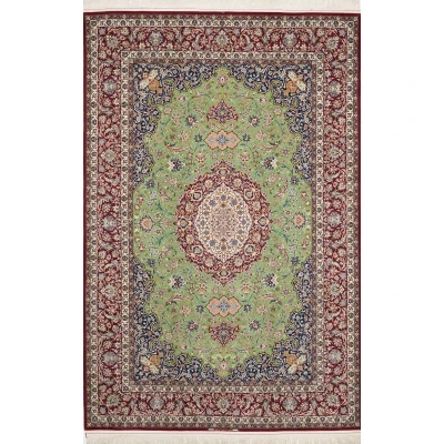 "Vibrant color scheme on oriental weaver rug crafted by Ahmad Zojaji"