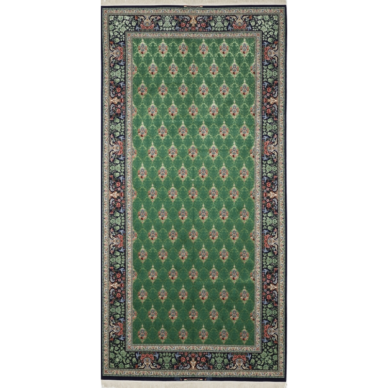 Full view of the unique 400 cm x 200 cm high knot density rug with elaborate floral motifs