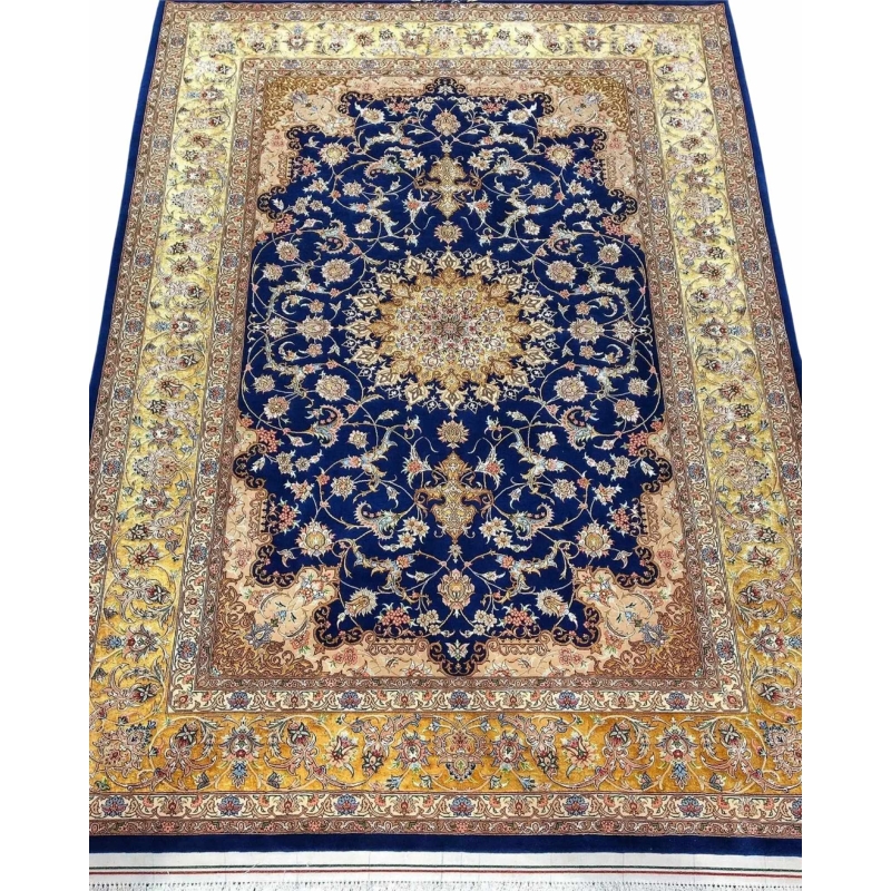 "Hand-knotted Isfahan Persian rug with a majestic navy blue background and golden floral medallion."