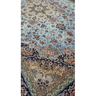 Hand-knotted wool and silk Persian carpet from Isfahan