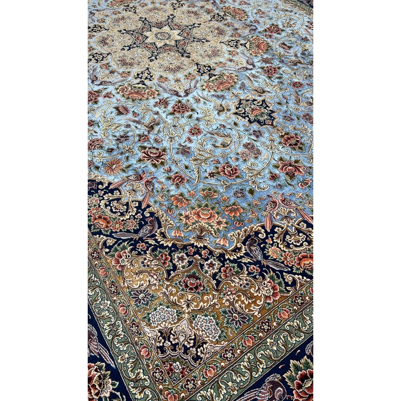 Hand-knotted wool and silk Persian carpet from Isfahan
