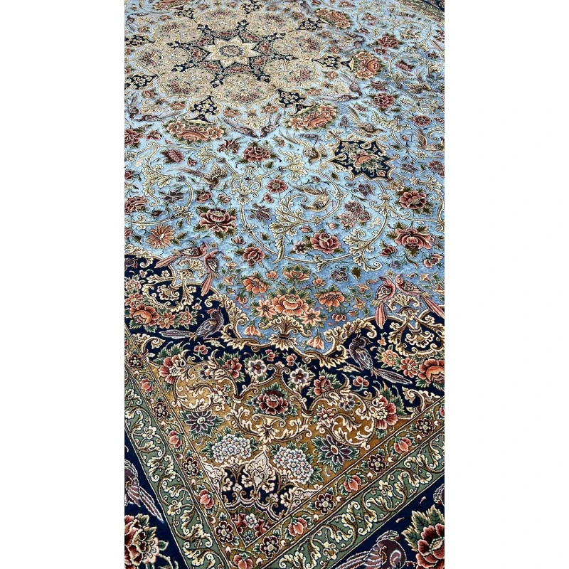 Hand-knotted wool and silk Persian carpet from Isfahan