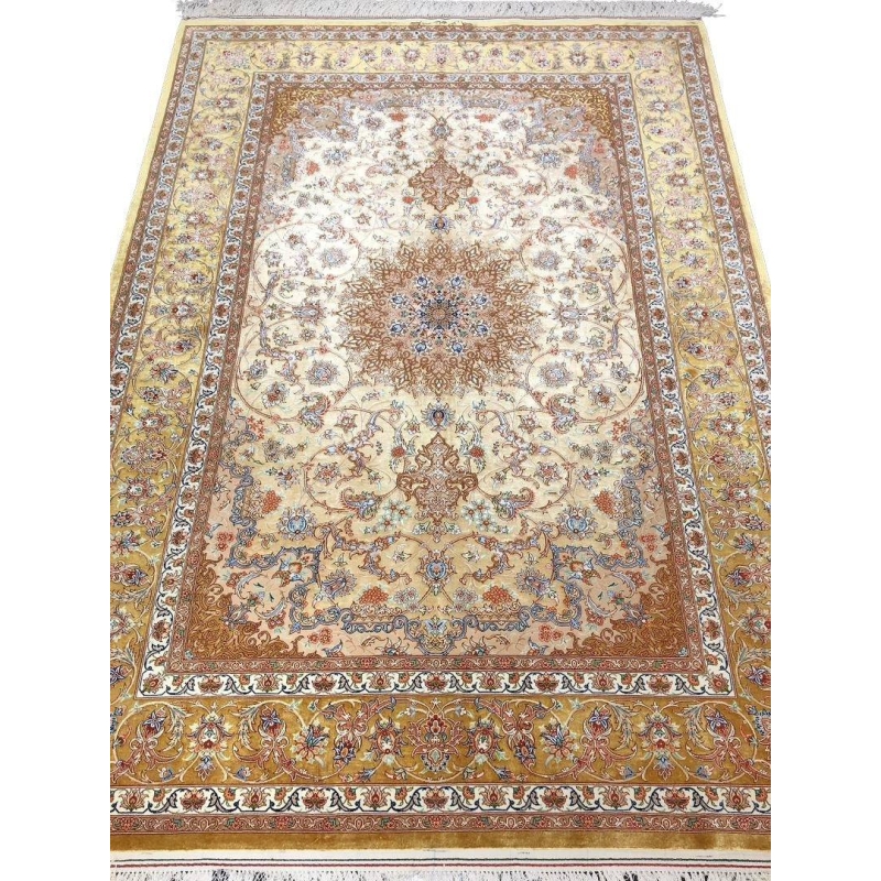 "Hand-knotted Isfahan Persian rug with a golden floral medallion design, crafted from fine wool and silk."