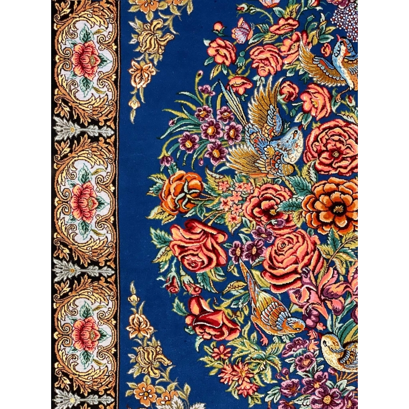 "Authentic Isfahan silk Persian rug with black floral border, golden roses, and a detailed bird and flower pattern."