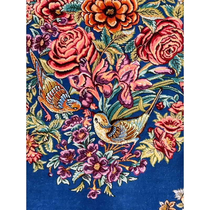 "Small Persian silk rug for wall hanging or accent décor, showcasing a traditional floral bouquet and bird design."