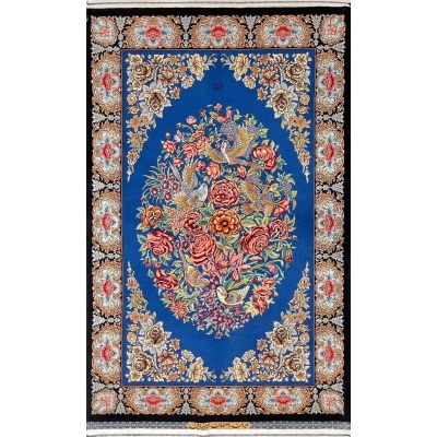 "Hand-knotted Isfahan Persian rug featuring an oval floral bouquet and flying birds on a deep blue silk base."