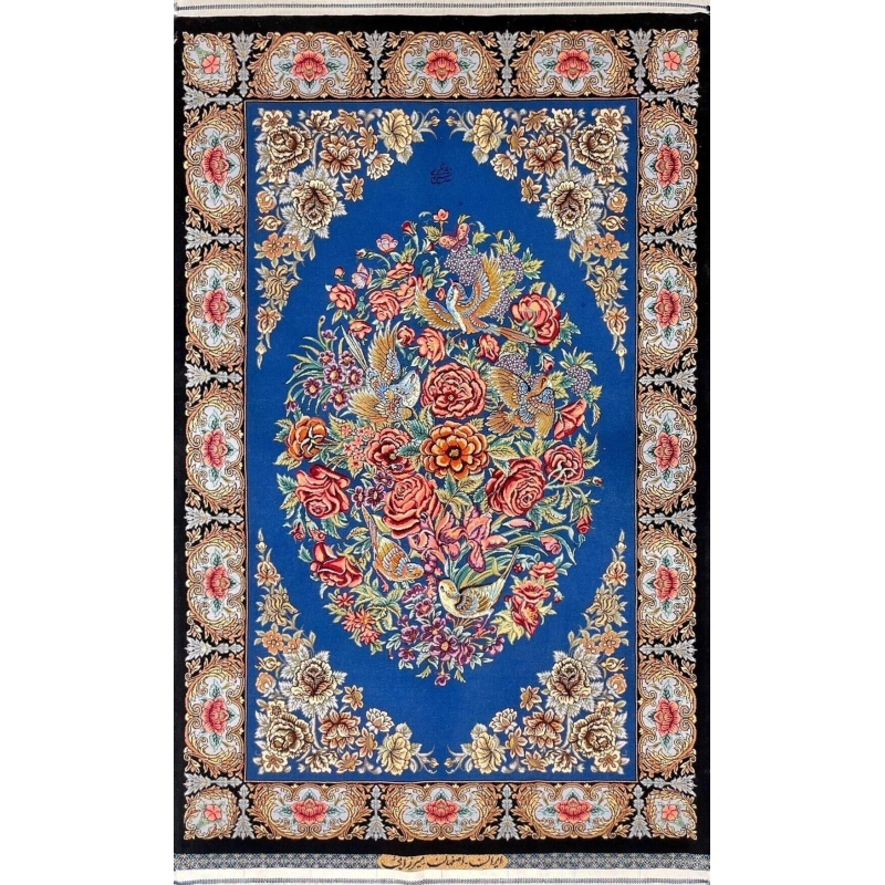 "Hand-knotted Isfahan Persian rug featuring an oval floral bouquet and flying birds on a deep blue silk base."