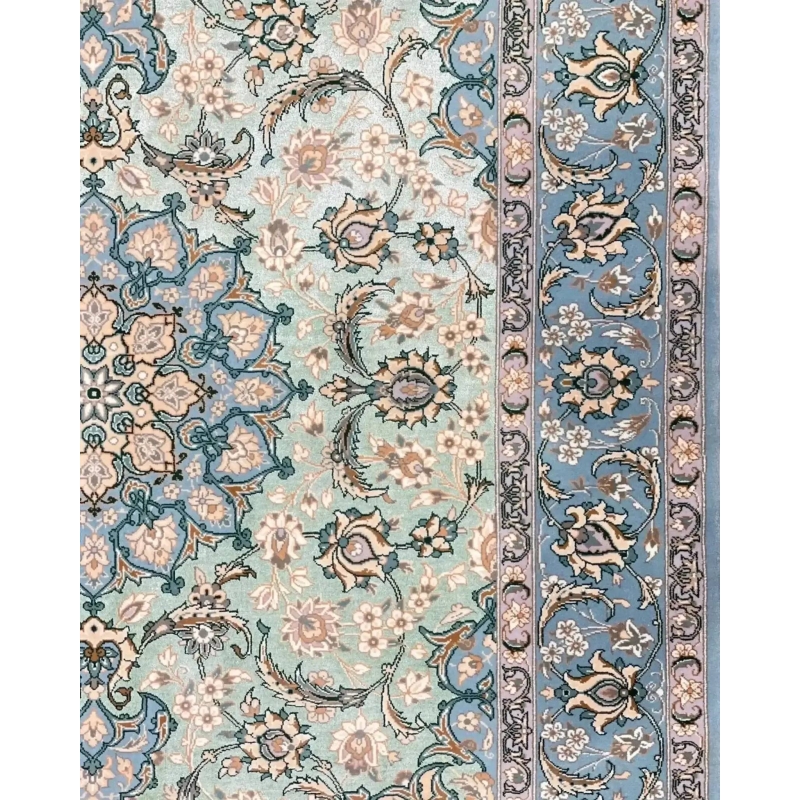 "Elegant wool and silk Persian rug featuring delicate floral arabesque patterns and a timeless Isfahan design."