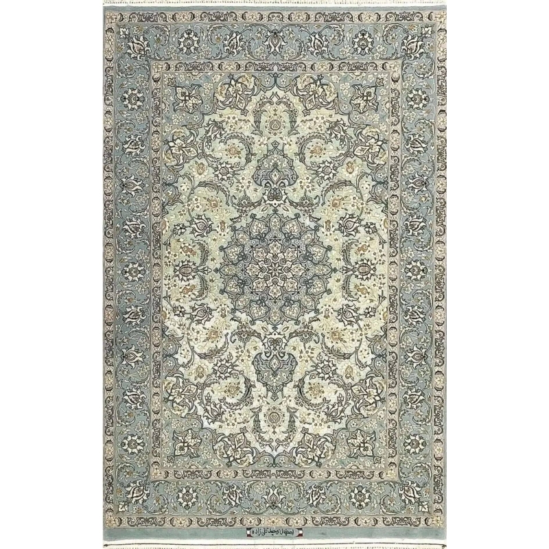 "Handmade Isfahan Persian rug with intricate floral medallion, crafted from fine silk and wool in soft blue and ivory."