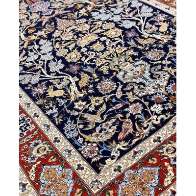 Handmade Persian rug for sale, crafted in Isfahan with floral and bird motifs