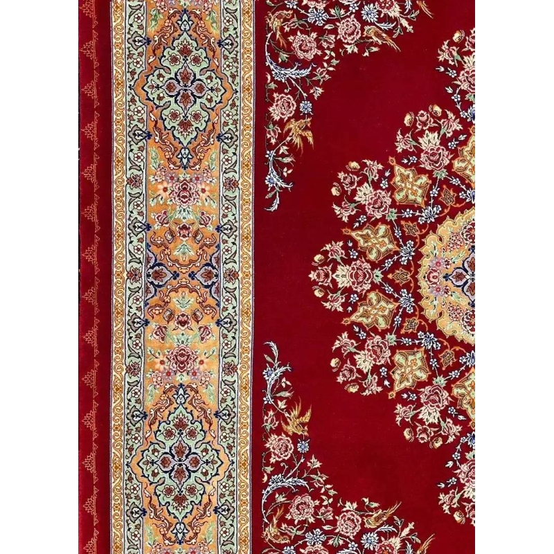 "Authentic handmade Persian rug with a stunning medallion, floral motifs, and luxurious silk detailing."