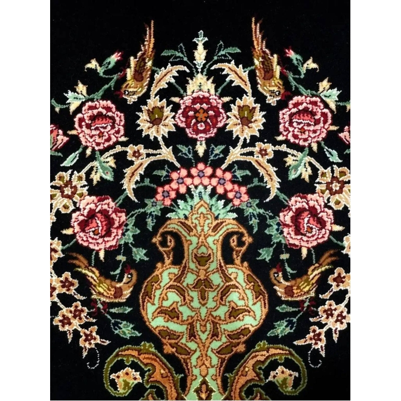 "Silk and wool Persian rug with detailed patterns and craftsmanship."