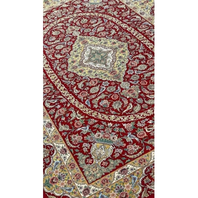 "Luxury red Isfahan Persian rug, handwoven with wool and silk flowers, measuring 240x160 cm. High knot density of 1,000,000 knots per m²."