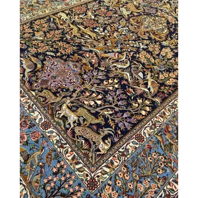 "Luxury Persian carpet from Isfahan, Iran, made of silk and wool with Persian wildlife and floral motifs."