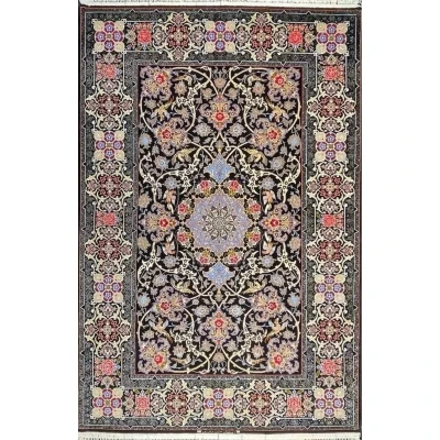 "Authentic Isfahan Persian rug in wool and silk with intricate floral design."