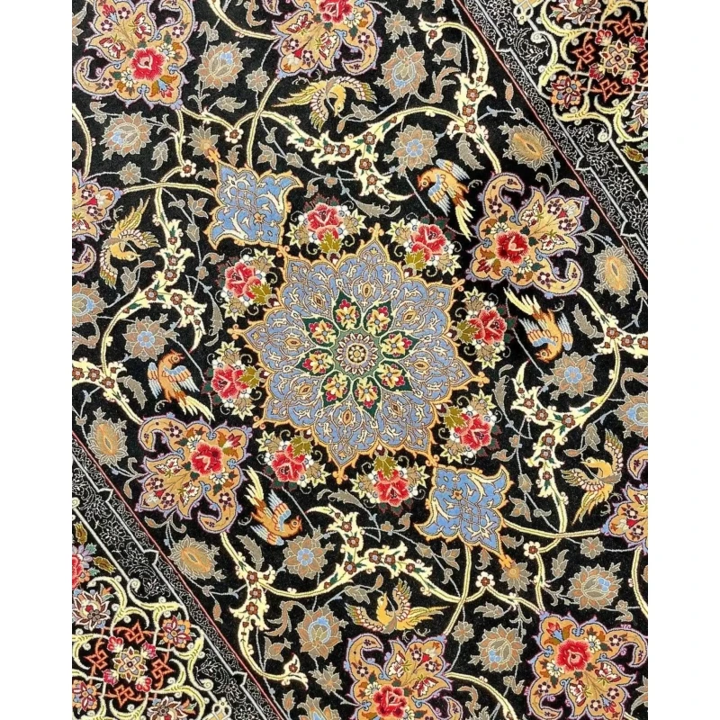 "Black and floral design Persian rug, crafted in Isfahan with silk and wool."