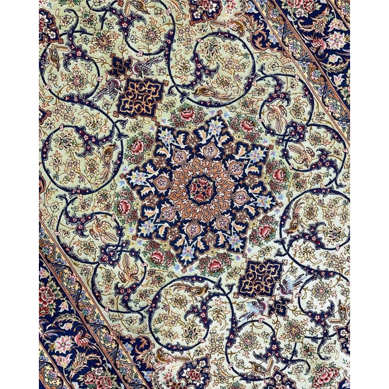 "Close-up view of handmade Isfahan rug, showcasing intricate floral and geometric designs in silk and wool."