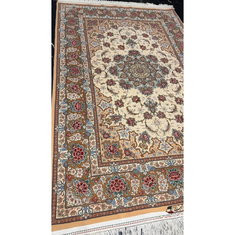 "Traditional Persian rug handmade in Isfahan, featuring a silk warp and wool-silk pile, measuring 220 cm x 150 cm. High-quality craftsmanship with intricate designs and vibrant colors."