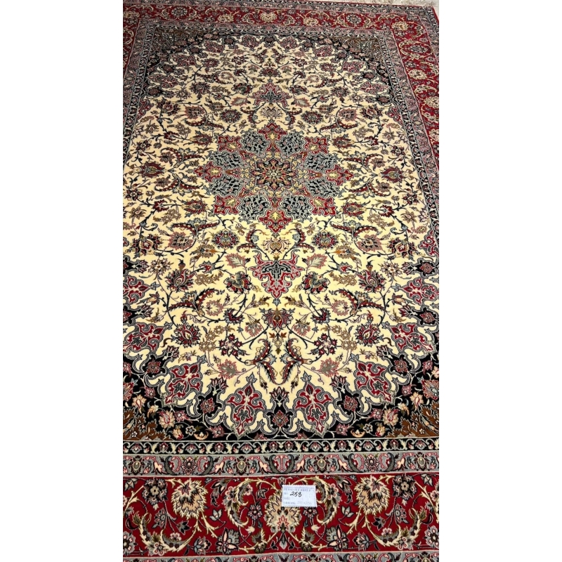 Luxury Isfahan carpet with central medallion pattern.