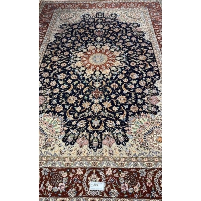 "Premium Persian rug with deep navy, burgundy, and ivory floral patterns, perfect for luxury home decor."