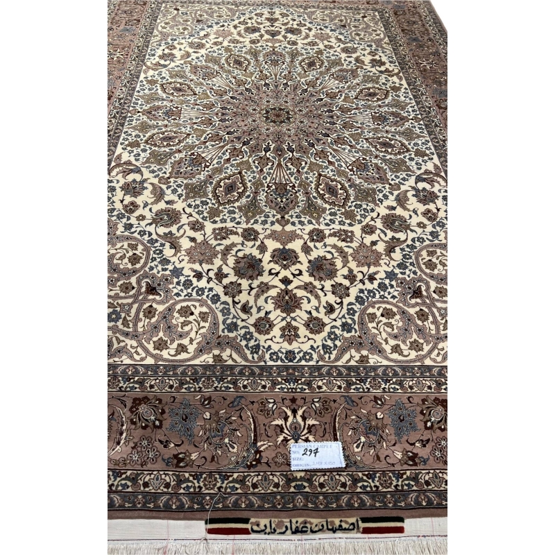Vintage handwoven Persian carpet in beige and brown tones.