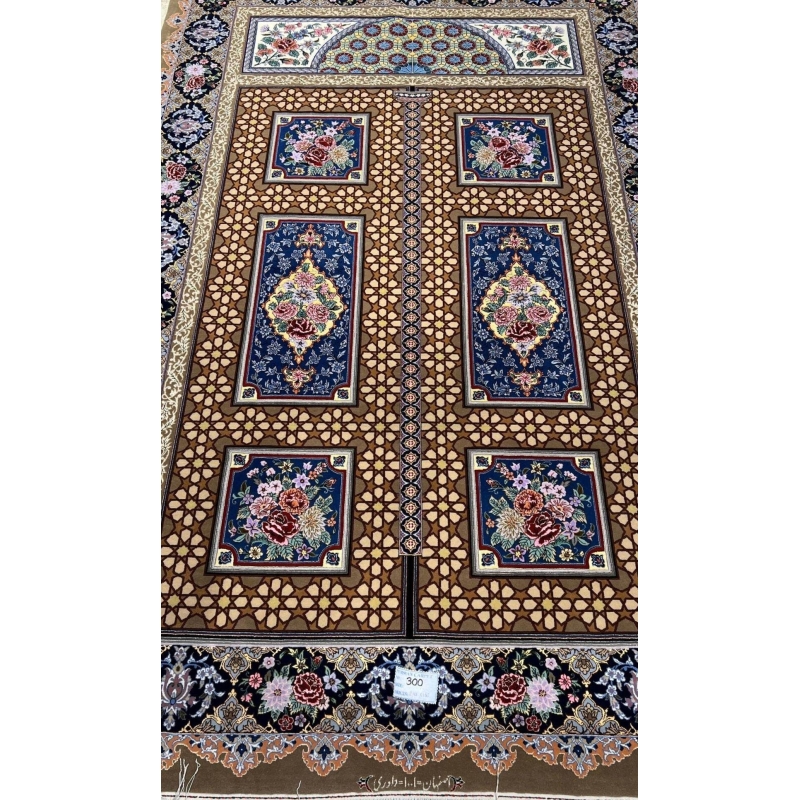 Persian Isfahan rug with geometric and floral designs.