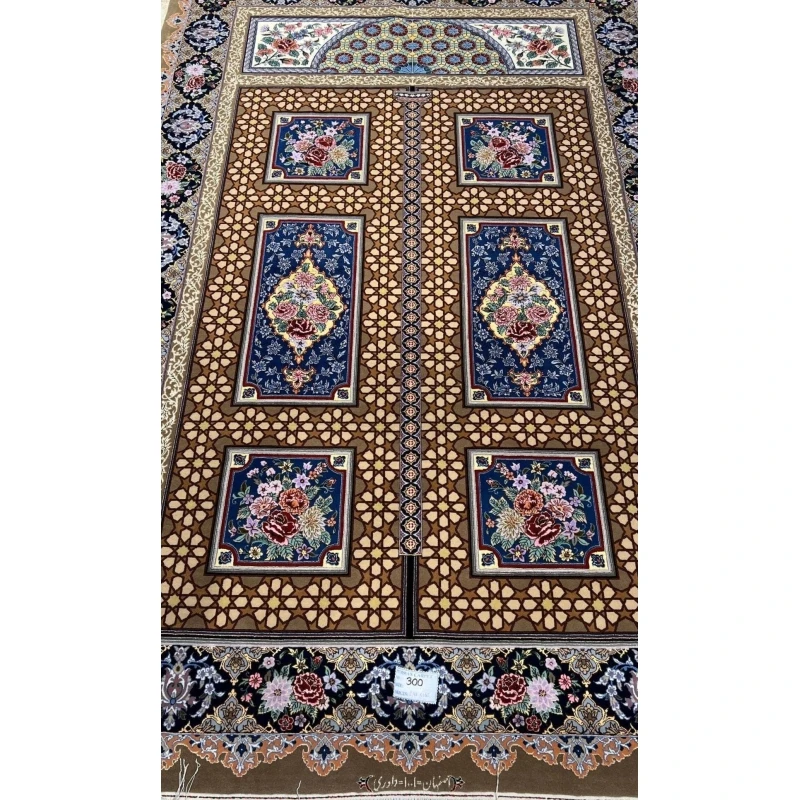 Persian Isfahan rug with geometric and floral designs.