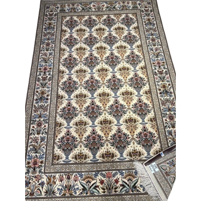 "Hand-knotted Persian rug in cream, blue, and pink tones from Isfahan"