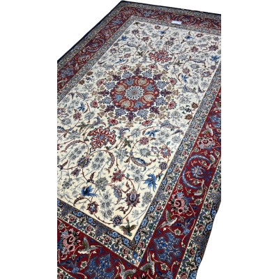 Hand-knotted Persian rug with wool and silk, red and cream colors