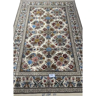 "Floral design on Isfahan Persian rug, hand-knotted with silk and wool."