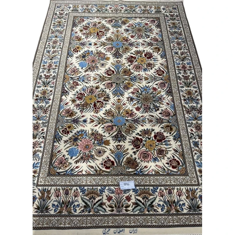 "Floral design on Isfahan Persian rug, hand-knotted with silk and wool."