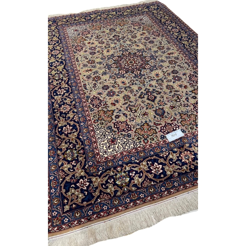 "Side view of the 70-year-old hand-knotted Isfahan rug with wool and silk blend."