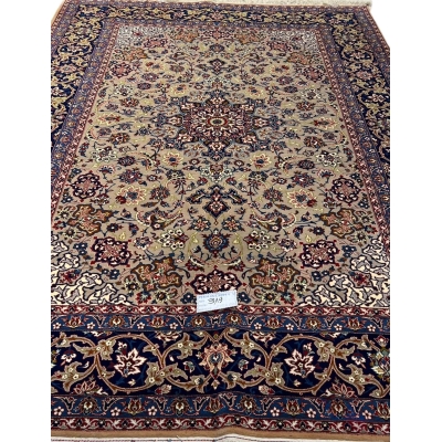 "Antique Isfahan rug, 70 years old, hand-knotted with floral patterns, 7 x 4.9 feet."