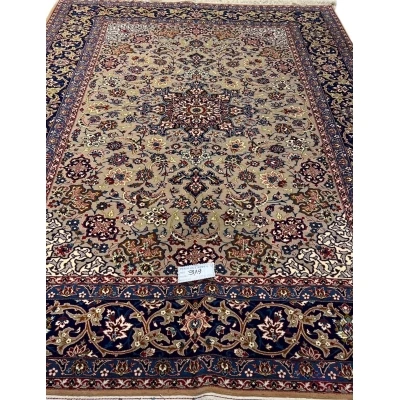 "Antique Isfahan rug, 70 years old, hand-knotted with floral patterns, 7 x 4.9 feet."