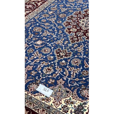 "Traditional Persian carpet with 700,000 knots per square meter, elegantly designed for fine interiors."