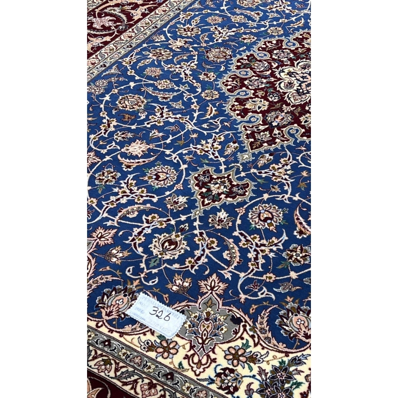 "Traditional Persian carpet with 700,000 knots per square meter, elegantly designed for fine interiors."