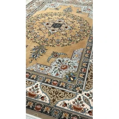 An expansive Isfahan rug showcasing intricate floral patterns and traditional craftsmanship